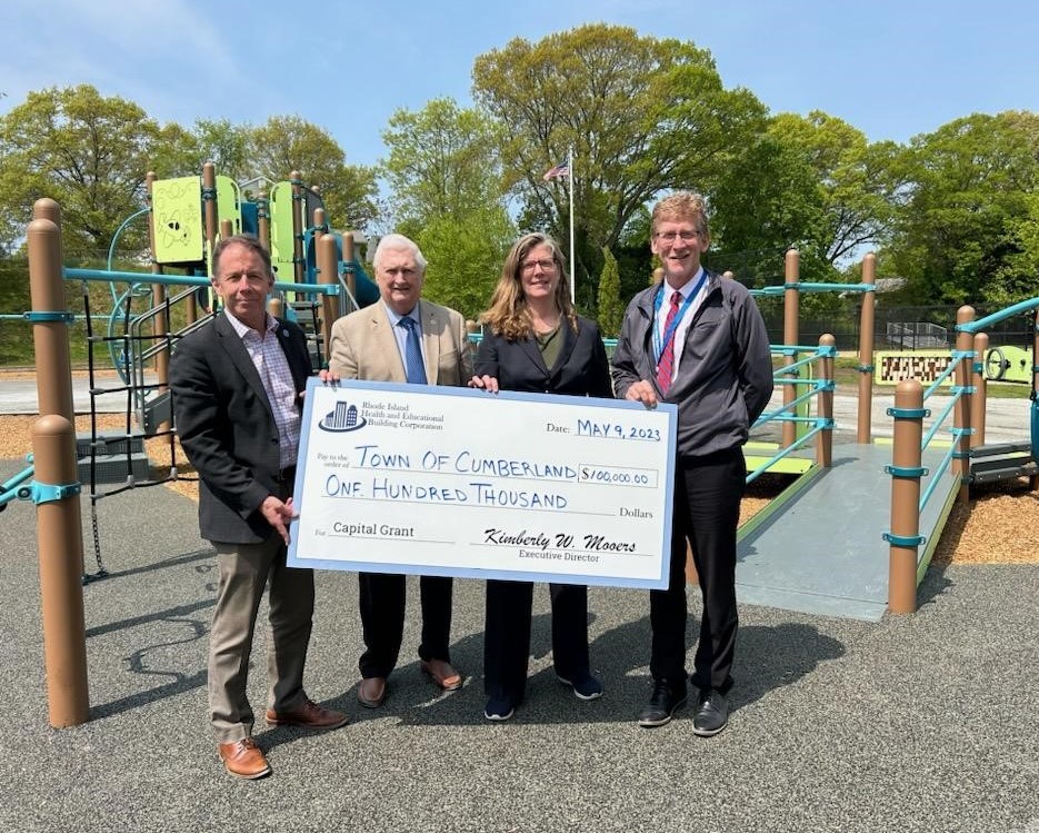 Pictured from left: Cumberland Mayor Jeff Mutter, RIHEBC Vice Chair William Murray, RIHEBC Executive Director Kim Mooers, and Dr. Philip Thornton, Superintendent of Schools.